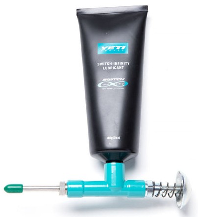 Yeti Grease Gun Turq Filled Complete